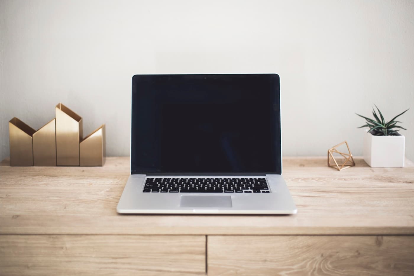 Laptop on a premium desk setup